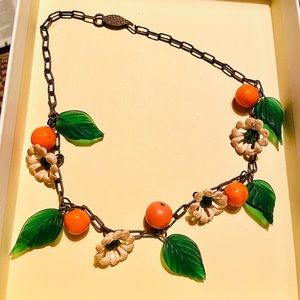 Vintage brass? Leaf and flower necklace. Stunning and simple.